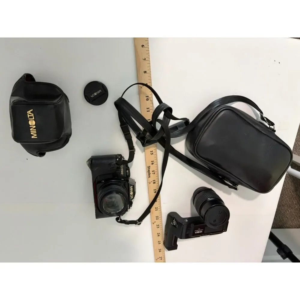 Minolta X-700 with accessories and carry case.